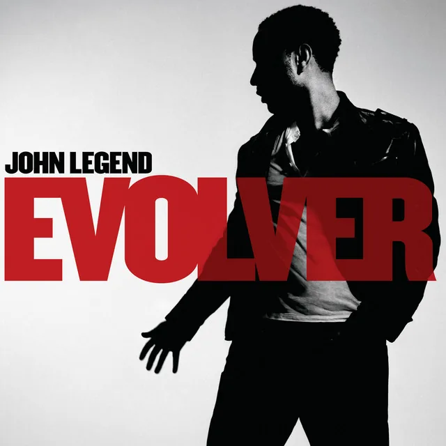 Evolver cover: the title in red over a black-and-white photo of John Legend turning away